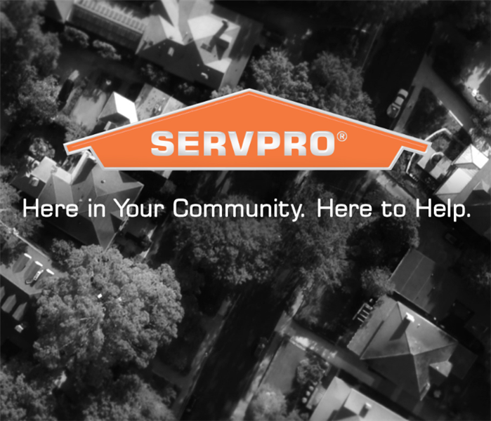 Black and white city image with SERVPRO logo over top